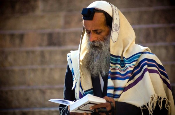 Orthodox Jewish Man in Prayer tall-tefillin-siddur