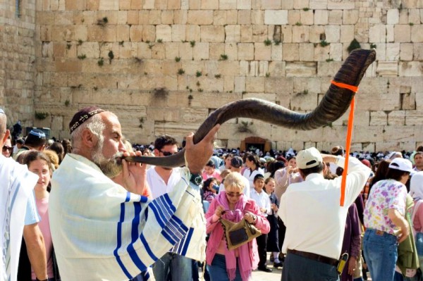 Jewish Man Blows a Long Shofar Shofar-Western-Wall-Kotel-Passover-Pesach