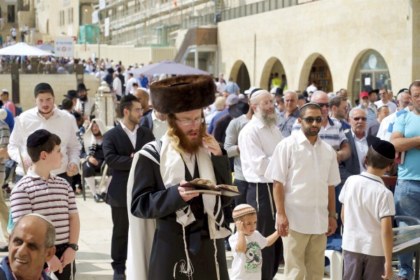 An Orthodox Jewish man prays in the men's section at the Western (Wailing) Wall Plaza in the Old City of Jerusalem. An Orthodox Jewish man prays in the men's section at the Western (Wailing) Wall Plaza in the Old City of Jerusalem.