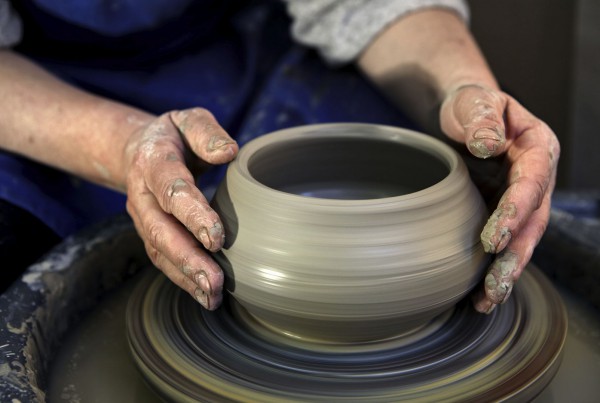 Making pottery clay-potter-wheel