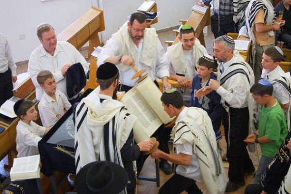 Preparing to Lift the Torah Scroll for the Congregation to See Torah-Scroll-Hagbah-Congregation