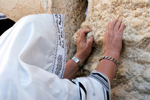 A Jewish man Prays at the Western (Wailing) Wall with His Tallit (Prayer Shawl) Pulled Over His Head prayer-Wall-tallit