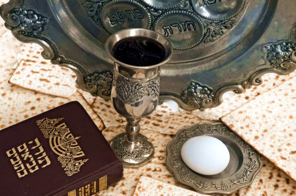 A Tanakh (Hebrew Old Testament) with symbolic foods representing Passover. The hard-boiled egg represents the offering in Temple times. matzah_egg_Bible