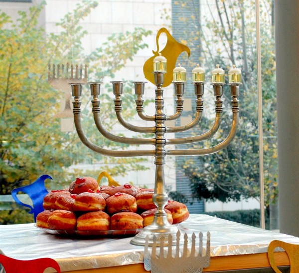 The fourth day of Chanukah with donuts (sufganiyot). Chanukah-hanukkah-menorah-hanukkia-sufganiyot-fourth-day