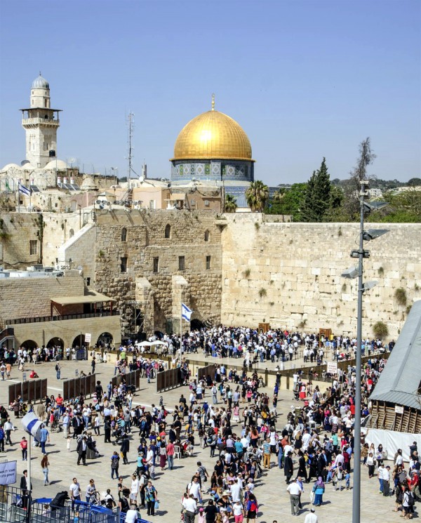 Western-Wall-at-Passove Jewish pilgrims visit the Western (Wailing) Wall during Passover. On the Temple Mount, the Muslim Dome of the Rock occupies the spot where the Holy of Holies once stood.