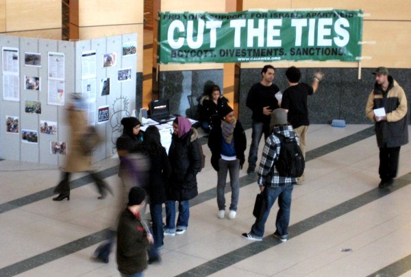 A banner at Toronto's York University in Toronto tells passersby to end their "support for Israeli Apartheid: cut the ties: boycott, divestments, sanctions." A banner at Toronto's York University in Toronto tells passersby to end their "support for Israeli Apartheid: cut the ties: boycott, divestments, sanctions."