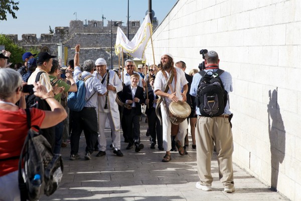 A Bar Mitzvah procession at the Western (Wailing) Wall in Jerusalem, a popular spot to be Bar Mitzvahed for men of all ages. A Bar Mitzvah procession at the Western (Wailing) Wall in Jerusalem, a popular spot to be Bar Mitzvahed for men of all ages.