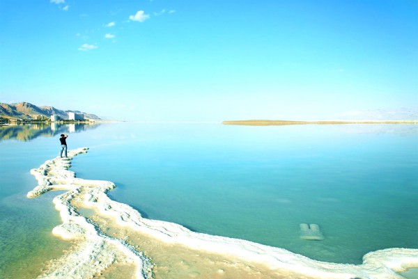 Photographer at the Dead Sea salt-formation-Dead Sea