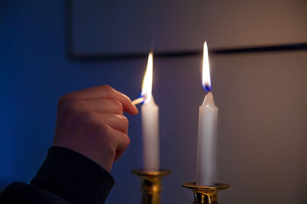 On Friday night, it is customary to kindle Shabbat candles just before the arrival of the Sabbath. (Photo by Robert Couse-Baker) On Friday night, it is customary to kindle Shabbat candles just before the arrival of the Sabbath. (Photo by Robert Couse-Baker)