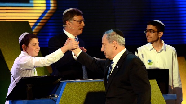 Netanyahu shakes the hand of Eyal Yitzhak Matas, first place Bible Quiz winner International Bible Contest First and Second Place Winners