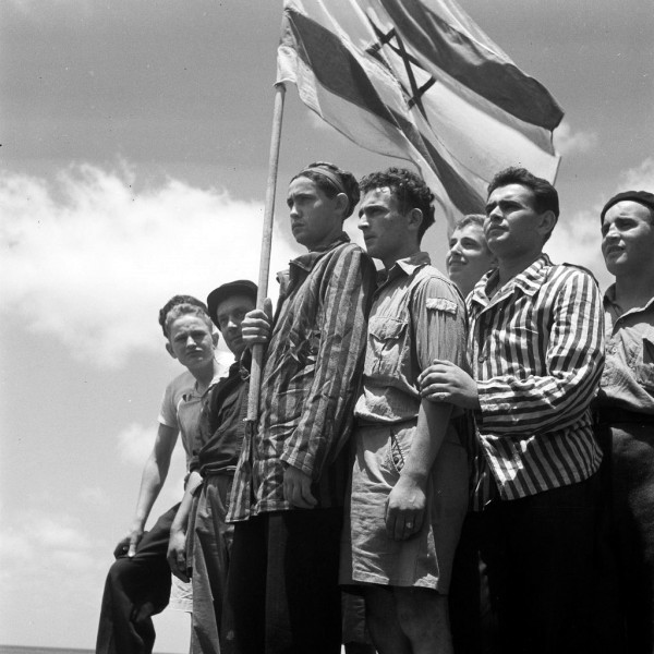 A group of former Buchenwald concentration camp inmates on board the refugee ship Mataroa in Haifa Port (July 7, 1945). (GPO photo by Kluger Zoltan)