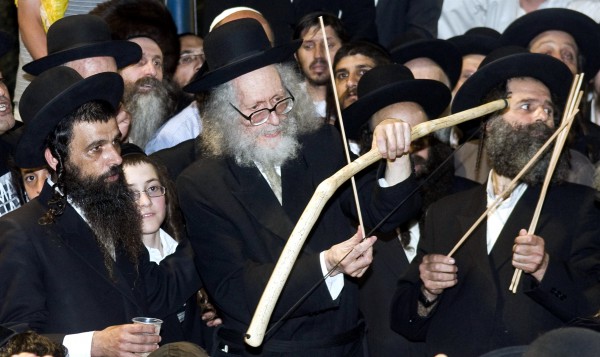 Rabbi Eliezer Berland shoots arrows with a bow near Bar Yochai's tomb in Meron, Israel during Lag BaOmer. Archery is a Lag BaOmer custom that, to some, represents Bar Yochai’s words which were shot like arrows, bringing repentance to the unholy. Rabbi Eliezer Berland shoots arrows with a bow near Bar Yochai's tomb in Meron, Israel during Lag BaOmer. Archery is a Lag BaOmer custom that, to some, represents Bar Yochai’s words which were shot like arrows, bringing repentance to the unholy.