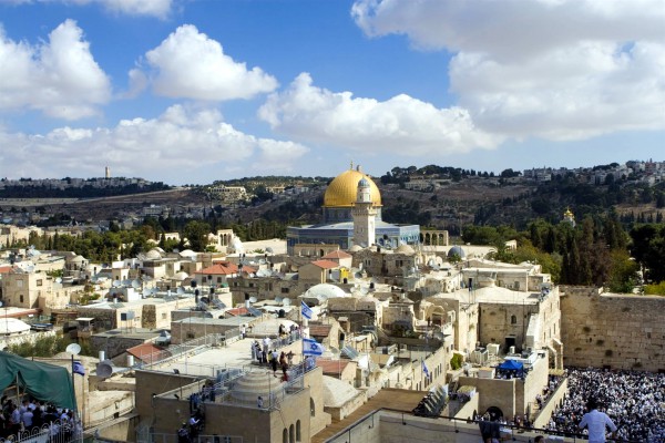 Crowds gather at the Western (Wailing) Wall in Jerusalem. Above the Wall is the Temple Mount. Just to the left of the Western Wall is the Muslim Dome of the Rock, which is thought to occupy the spot where the First and Second Jewish Temples were located. Crowds gather at the Western (Wailing) Wall in Jerusalem. Above the Wall is the Temple Mount. Just to the left of the Western Wall is the Muslim Dome of the Rock, which is thought to occupy the spot where the First and Second Jewish Temples were located.