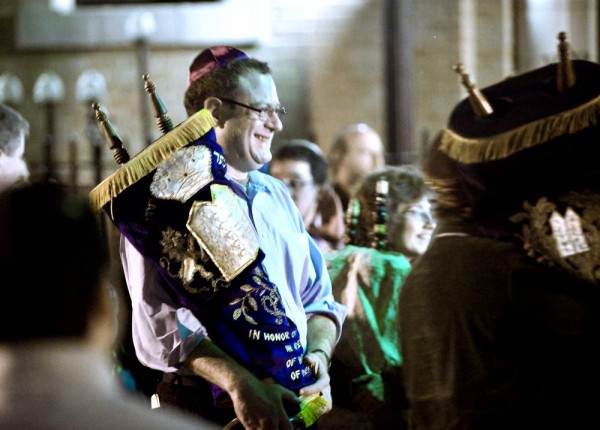 Torah scrolls are paraded in front of the United Synagogue of Hoboken on Simchat Torah. (Photo by Joe Epstein) Torah scrolls are paraded in front of the United Synagogue of Hoboken on Simchat Torah. (Photo by Joe Epstein)