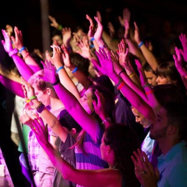raised-hands-of-Arab-and-Jewish-Believers-at-Elav Jewish, Arab, Believers, worship, Elav, reconciliation